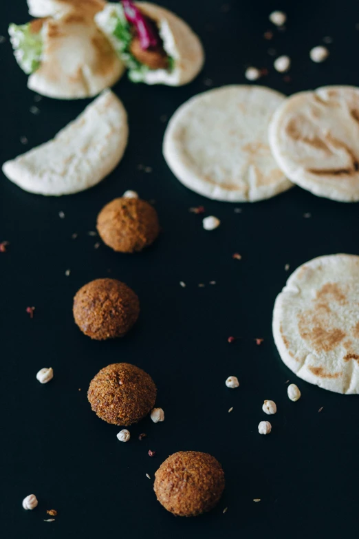 a bunch of food that is on a table, by Julia Pishtar, unsplash, dau-al-set, the moon orbiting other moons, egypt, cinnamon, detailed product shot