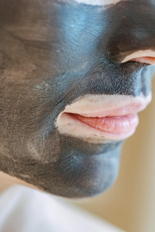 a close up of a person with a face mask, charcoal and champagne, smoothed lip line, ultra facial detail, shaven