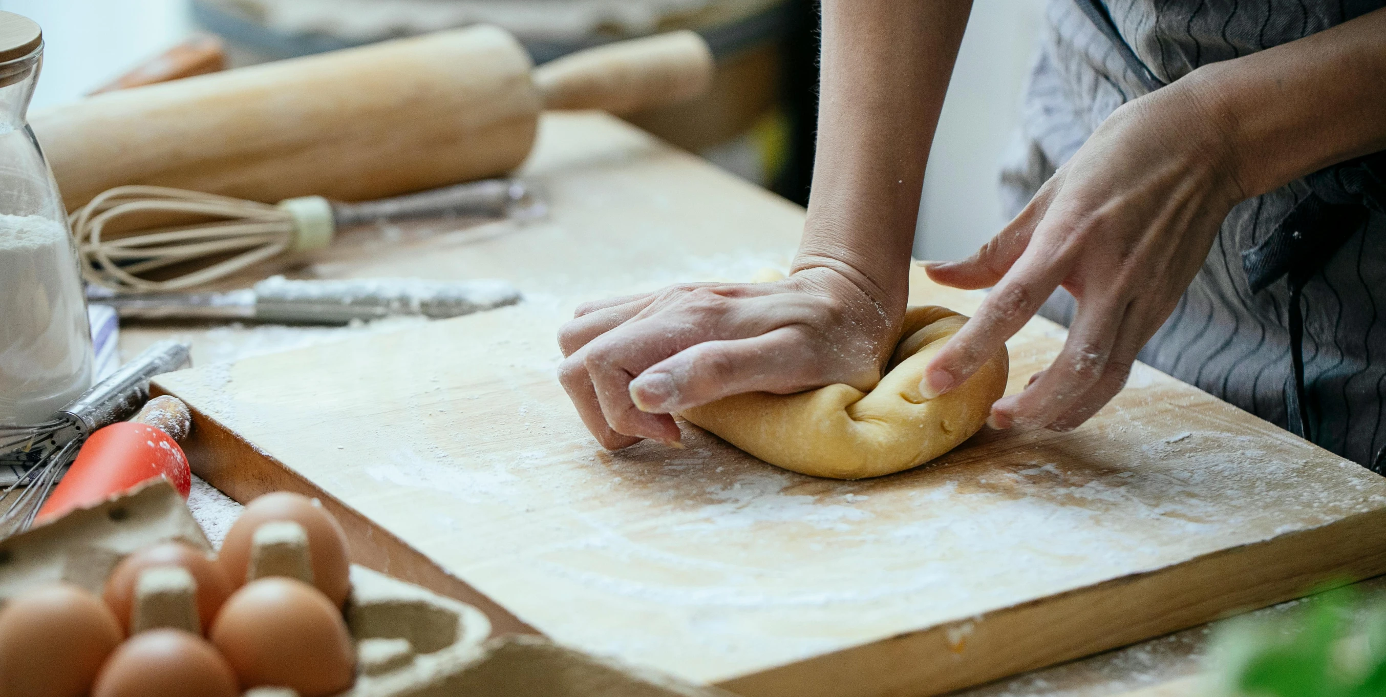 a person kn kn kn kn kn kn kn kn kn kn kn kn kn kn kn kn kn kn kn kn kn kn kn kn kn kn, a marble sculpture, inspired by Sarah Lucas, trending on pexels, cooking pizza, in a workshop, intricate pasta waves, fresh bakeries in the background