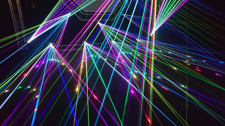 a bunch of lights that are in the air, a microscopic photo, by Josh Bayer, pexels, holography, colored lasers, star wars lasers, iphone picture, taken in the late 2010s