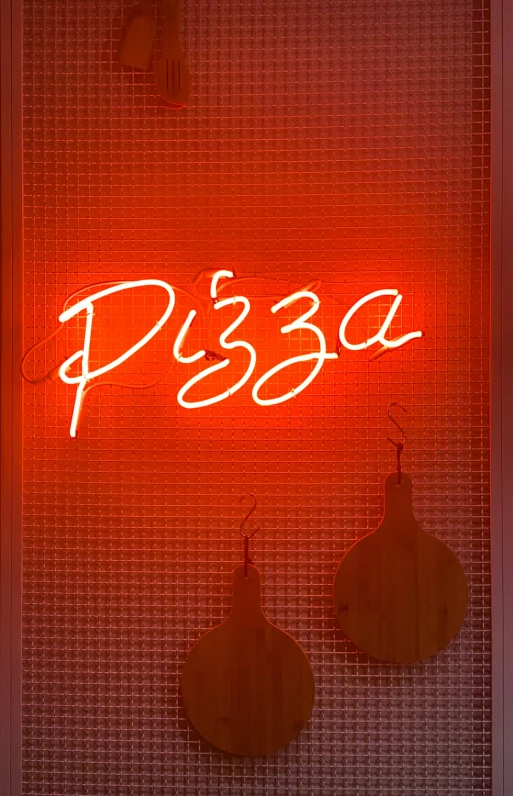 a neon sign that says pizza hanging on a wall, an album cover, by Liza Donnelly, pexels, light box, closeup at the food, ((neon colors))