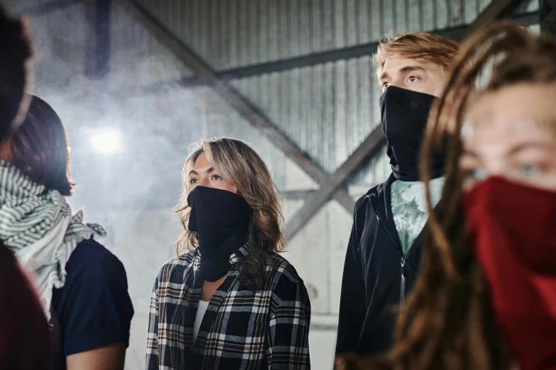 a group of people wearing face masks, inspired by Henry Macbeth-Raeburn, in an abandoned warehouse, streetwear, pokimane, smoke and gas