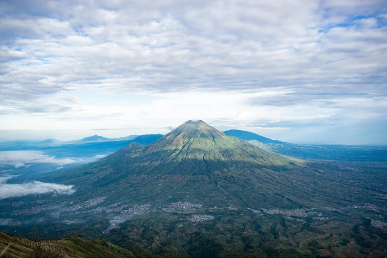 a view of a volcano from the top of a mountain, by Daniel Lieske, pexels contest winner, sumatraism, square, subtitles, paisley, avatar image