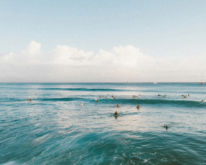 a group of people riding waves on top of surfboards, pexels contest winner, minimalism, ocean shoreline on the horizon, puddles of turquoise water, manly, astronaut in the ocean