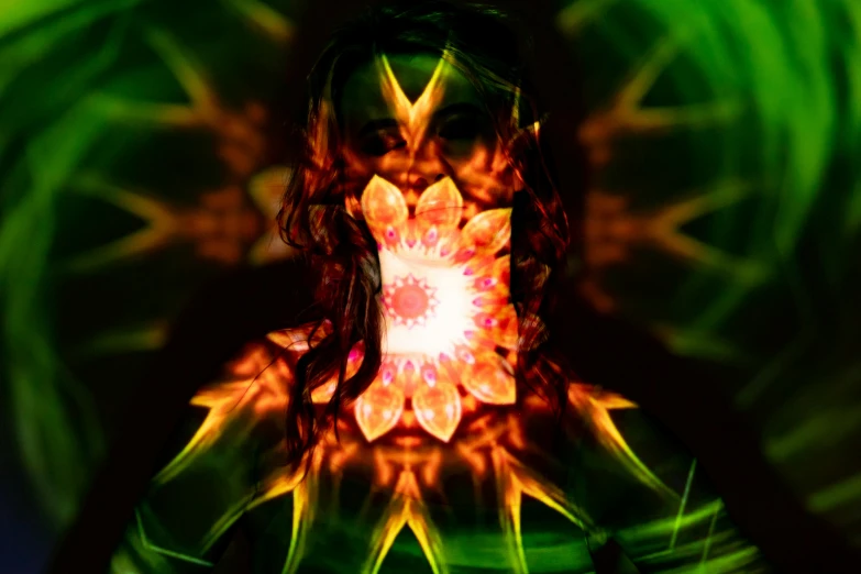 a woman standing in front of a green background, inspired by Anna Füssli, digital art, seen through a kaleidoscope, glowing amber, all face covered with a fire, with fractal sunlight