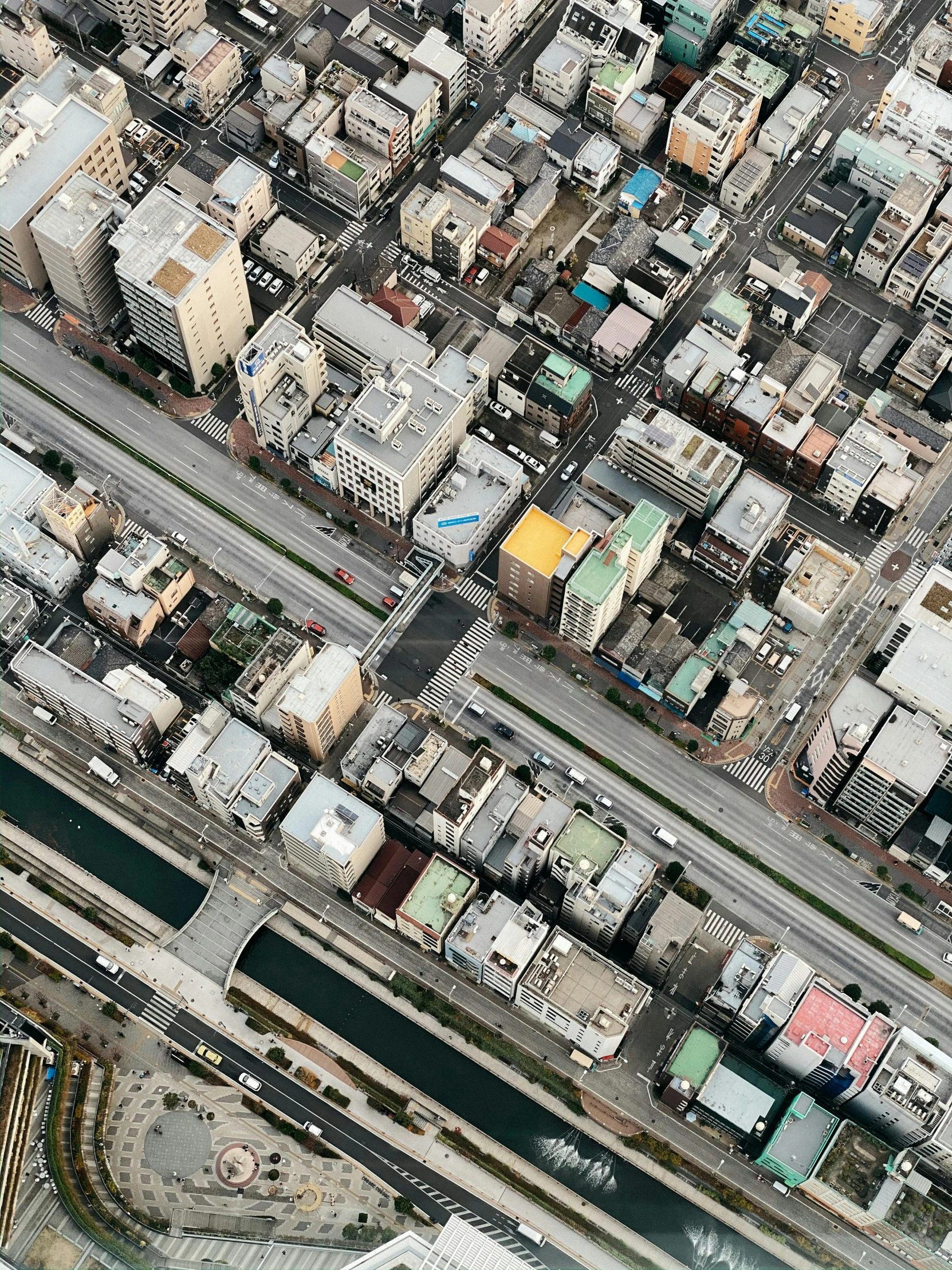 an aerial view of a city with lots of buildings, an album cover, by Yasushi Sugiyama, unsplash, square, houses and roads, ultra hi resolution picture, mapbox