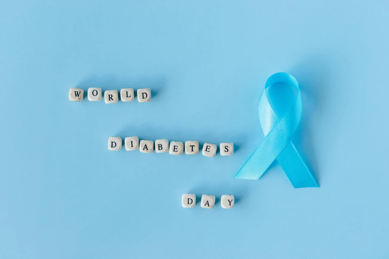 a blue awareness ribbon on a blue background, happening, 🚿🗝📝, word, disease, flatlay