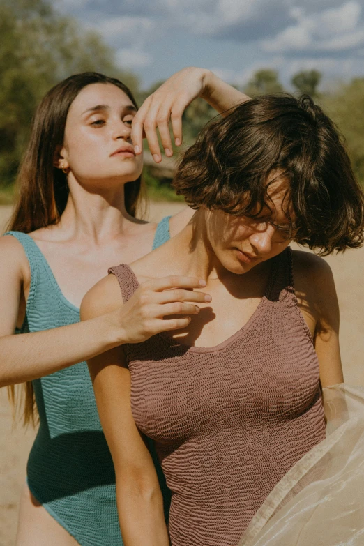 a couple of women standing next to each other, by Alexis Grimou, trending on pexels, renaissance, hair floating covering chest, soft shade, film still promotional image, movement