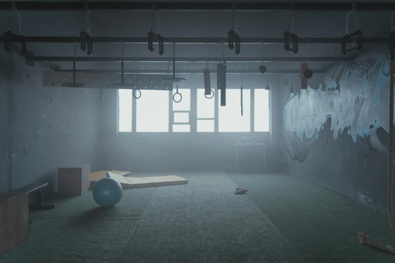 a gym room with a blue ball hanging from the ceiling, polycount contest winner, conceptual art, foggy room, many scars. cinematic lighting, anxiety environment, ue 4