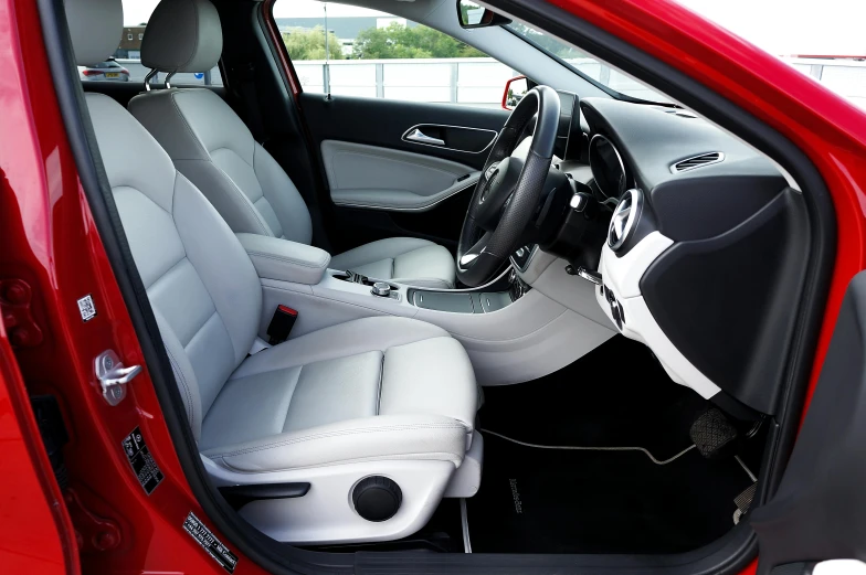 a picture of the inside of a car, pexels, silver white red details, square, commercially ready, facing left