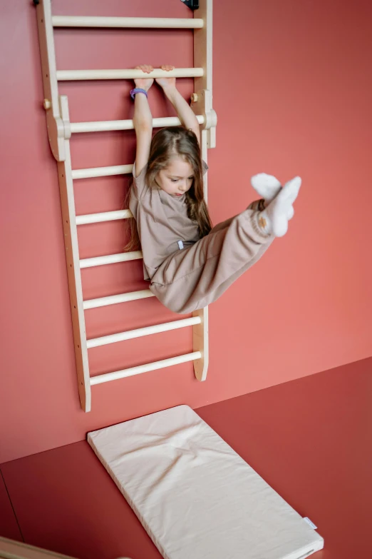 a little girl standing on top of a wooden ladder, by Nina Hamnett, process art, beige, soft pads, sports setting, stretching to walls