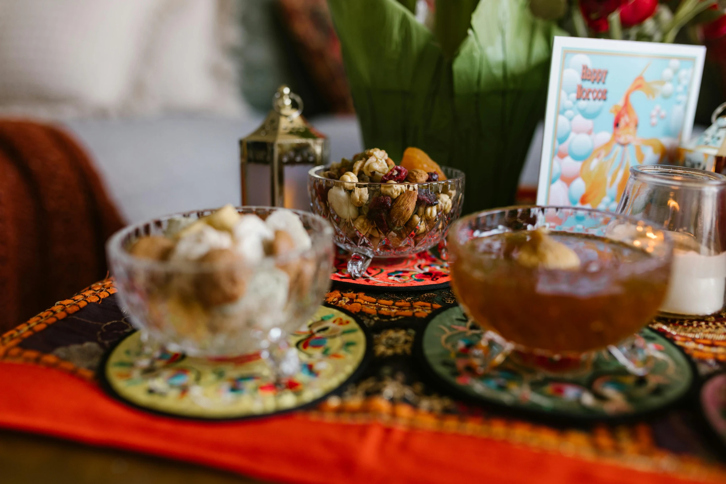 a table topped with bowls of food on top of a table, by Julia Pishtar, pexels, renaissance, cheburashka, desserts, persian design, background image