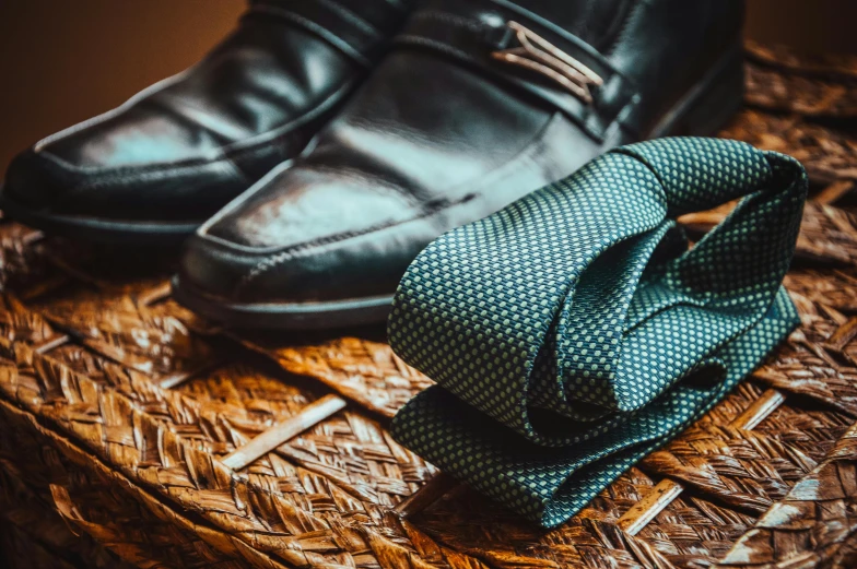 a close up of a pair of shoes and a tie, a still life, trending on unsplash, renaissance, ornate dark green clothing, avatar image