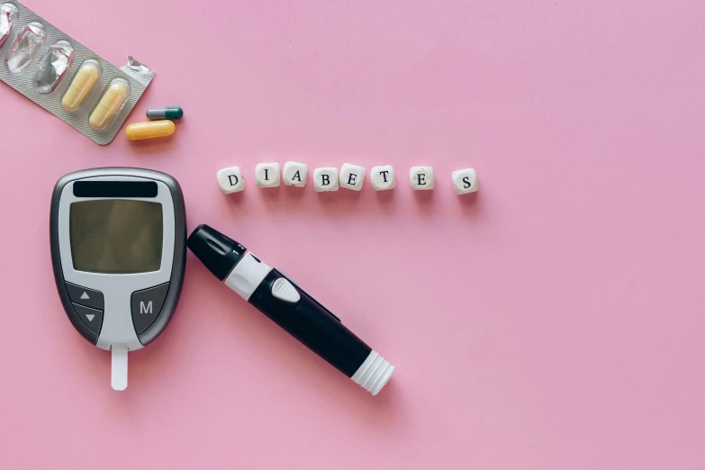 a blood sugar tester, pills, and pills on a pink surface, a picture, by Daniel Lieske, trending on pexels, happening, 🎀 🧟 🍓 🧚, medical machinery, background image, dials