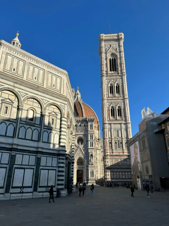 a very tall clock tower towering over a city, a photo, inspired by Giotto, pexels contest winner, renaissance, ground level view, with great domes and arches, 🚿🗝📝, square