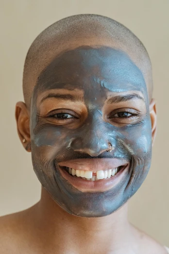 a close up of a person with a face mask, looking happy, charcoal color skin, genderless, smooth blue skin