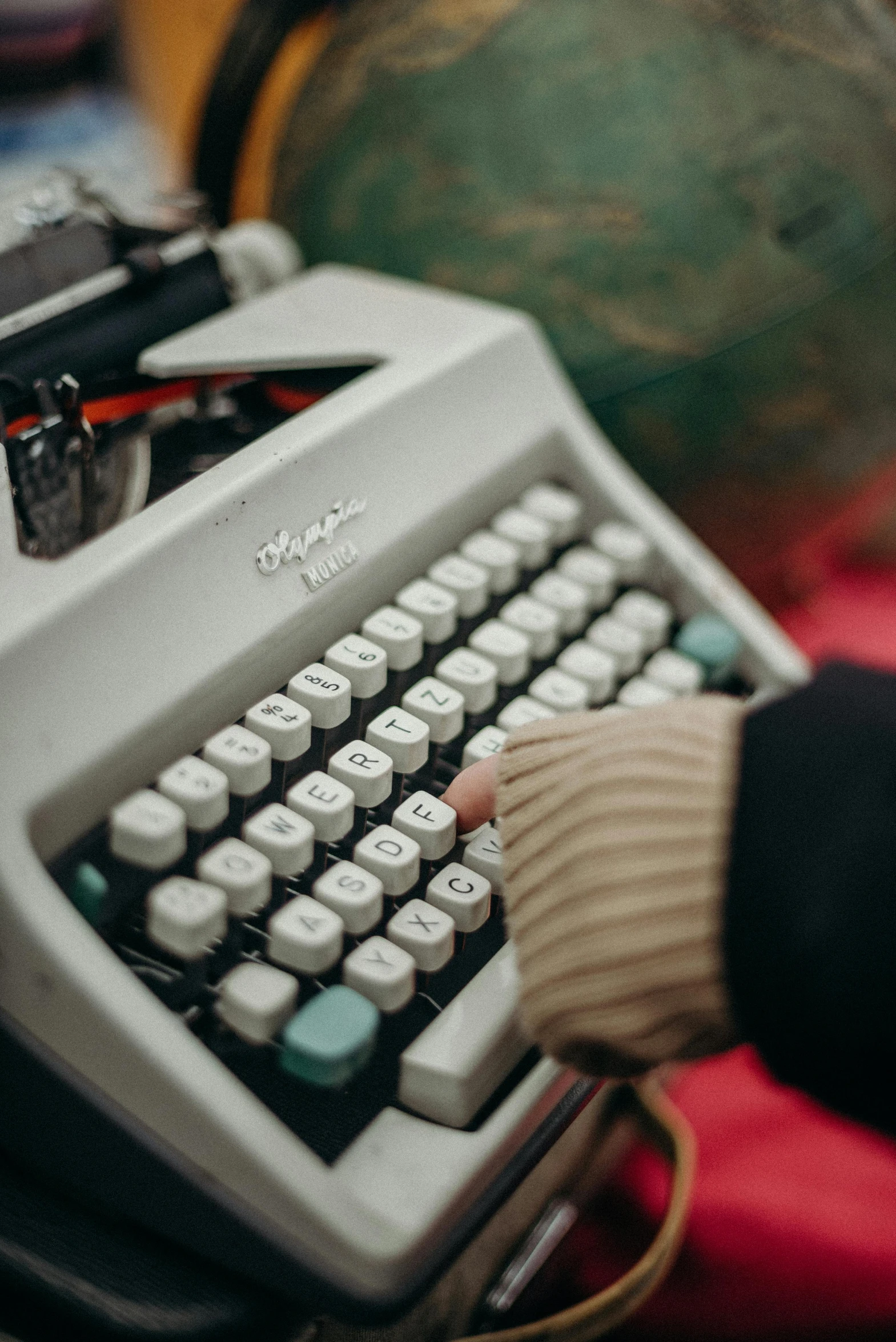 a person typing on an old typewriter, inspired by Elsa Bleda, unsplash, instagram story, white, 15081959 21121991 01012000 4k, 8k octan photo