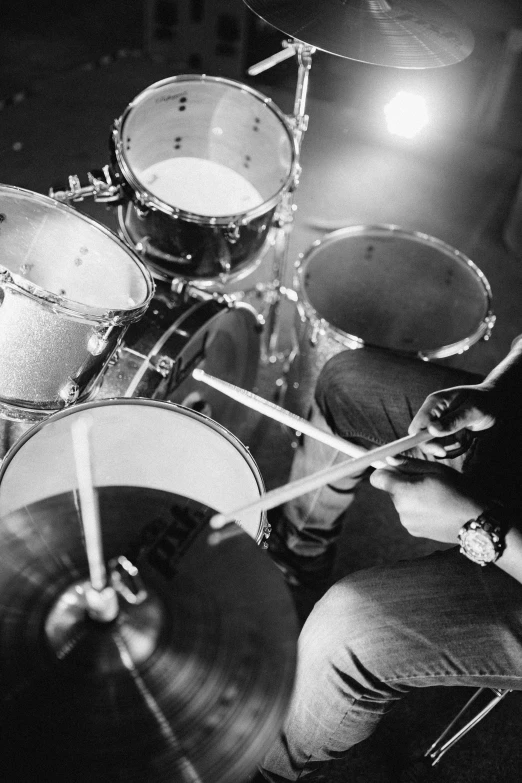 a black and white photo of a man playing drums, uploaded, getty images, 15081959 21121991 01012000 4k, tri - x 4 0 0