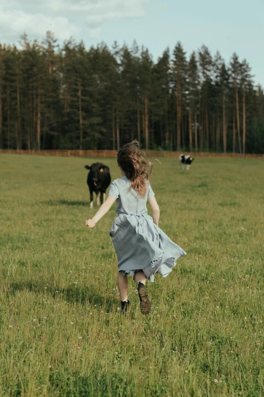 a girl running in a field with cows in the background, pexels contest winner, renaissance, simin stalenhag, daughter, organic dress, hd footage