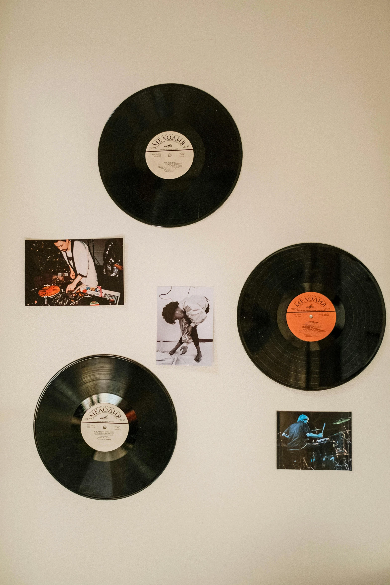 a wall that has a bunch of records on it, pexels contest winner, funk art, b. b king, pitch black room, a high angle shot, at home