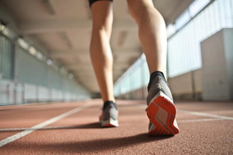 a close up of a person running on a track, renaissance, local gym, profile image, thumbnail, 5 feet away