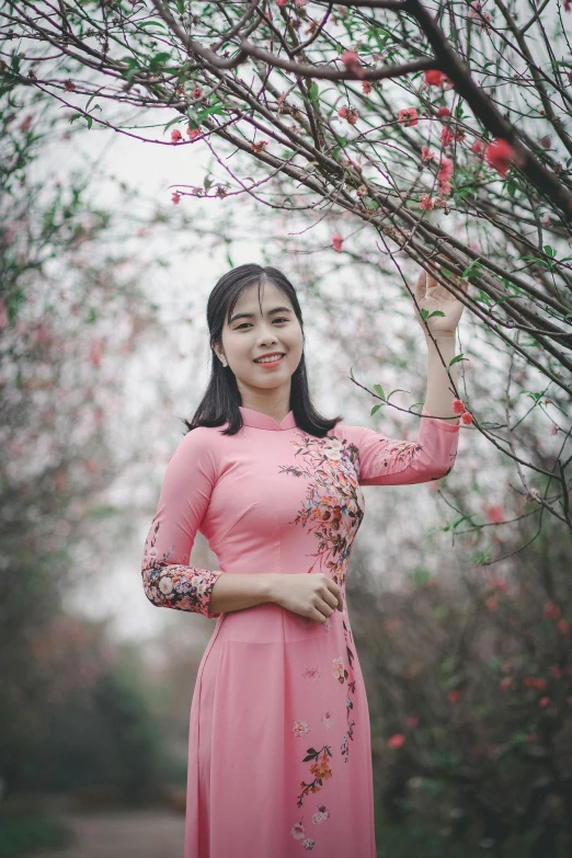 a woman in a pink dress posing for a picture, a picture, inspired by Cui Bai, pexels contest winner, 15081959 21121991 01012000 4k, low quality, february), smol