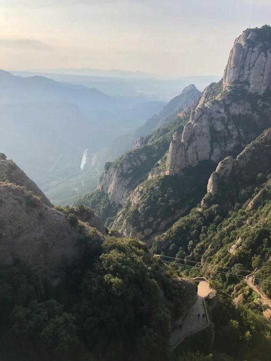 a view of the mountains from the top of a mountain, a picture, les nabis, monserrat gudiol, multiple stories, thumbnail