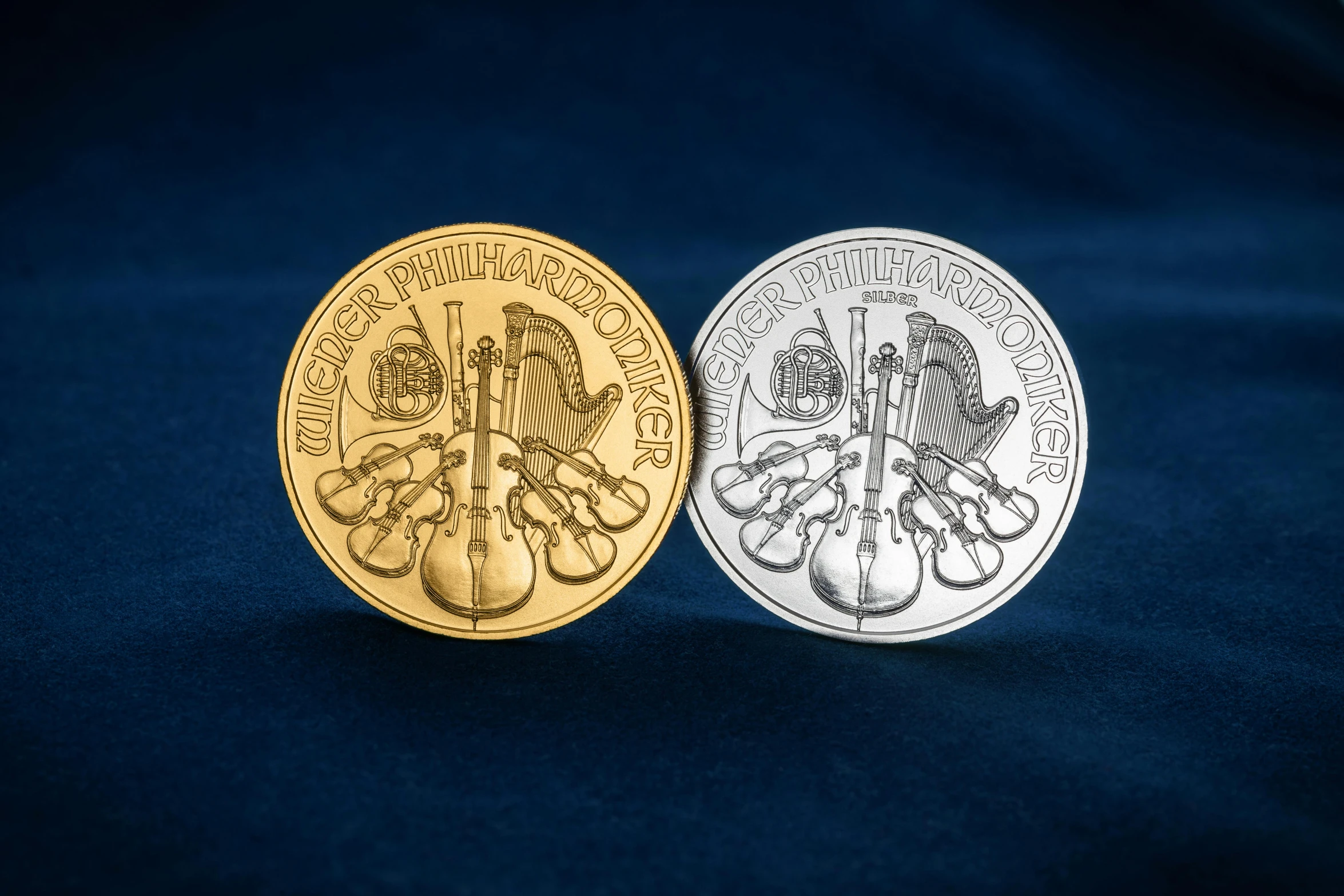 two gold and silver olympic coins on a blue background, an album cover, inspired by Wilhelm Trübner, art nouveau, double bass, multiplayer set-piece, contest winner 2021, award winning engraving