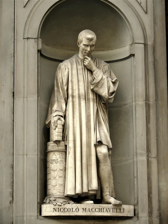 a statue of a man standing in front of a building, robed renaissance scholar, wearing robes of silver, 🚿🗝📝, tall columns