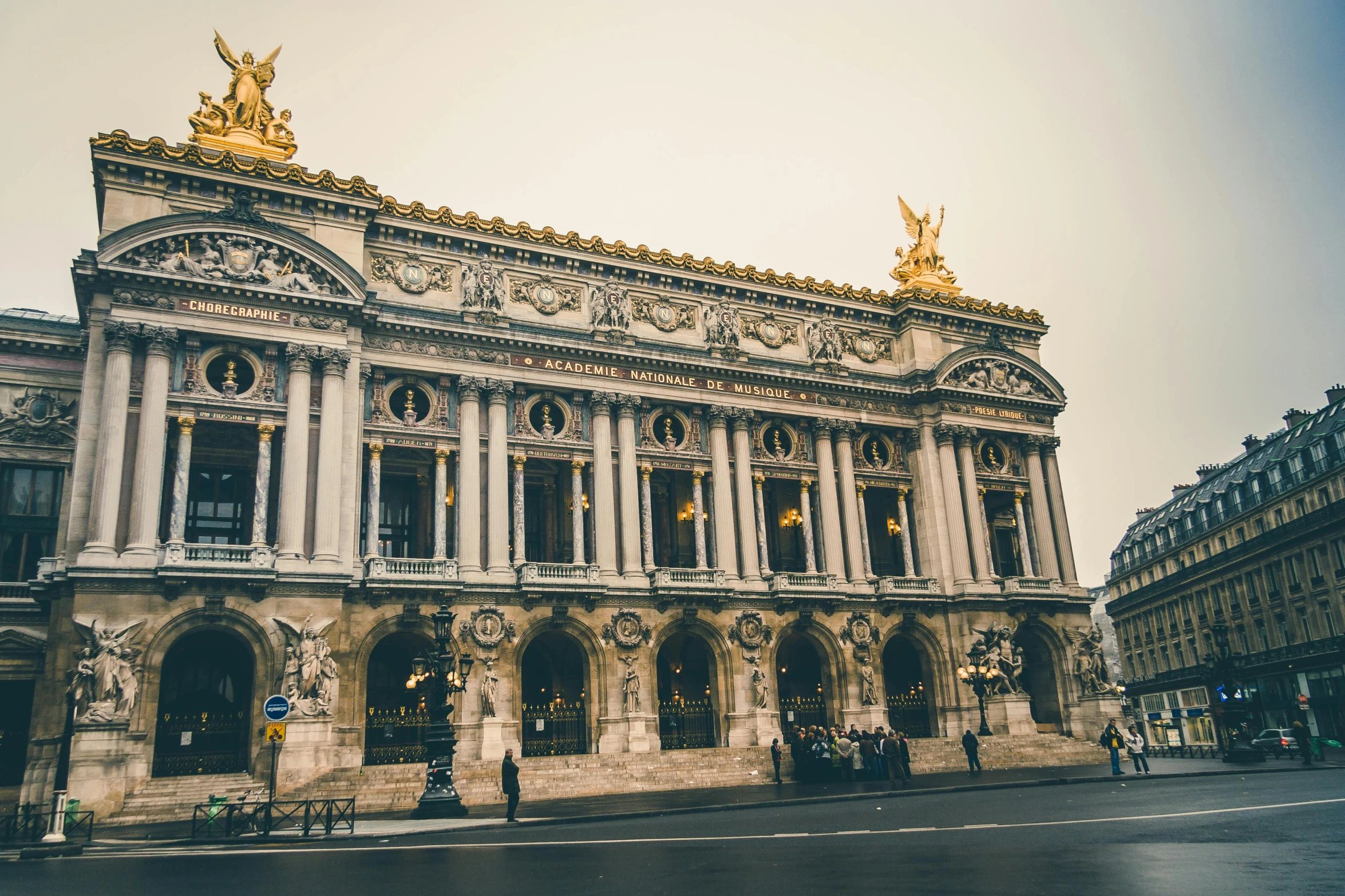 a large building sitting on the side of a street, by François Girardon, pexels contest winner, neoclassicism, decorated with opera motifs, promo image, square, cinematic paris