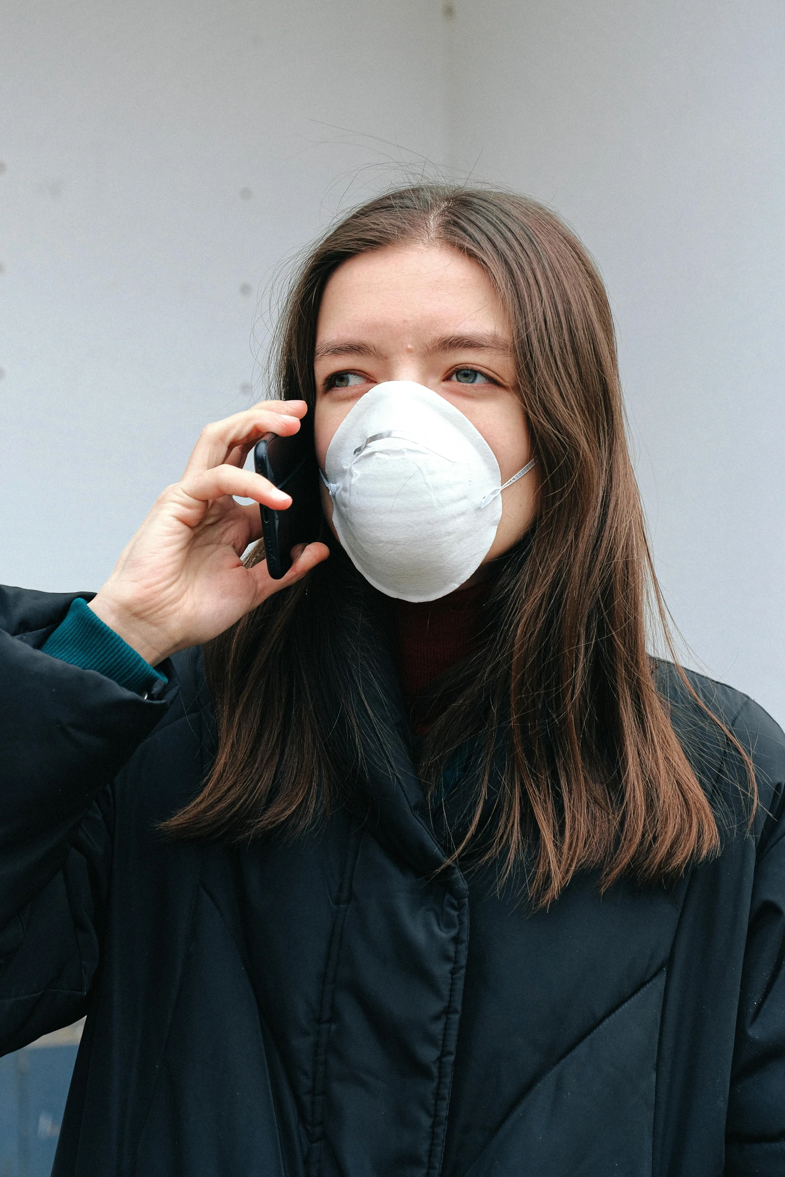 a woman talking on a cell phone while wearing a mask, sanja stikovic, square, cone, basic