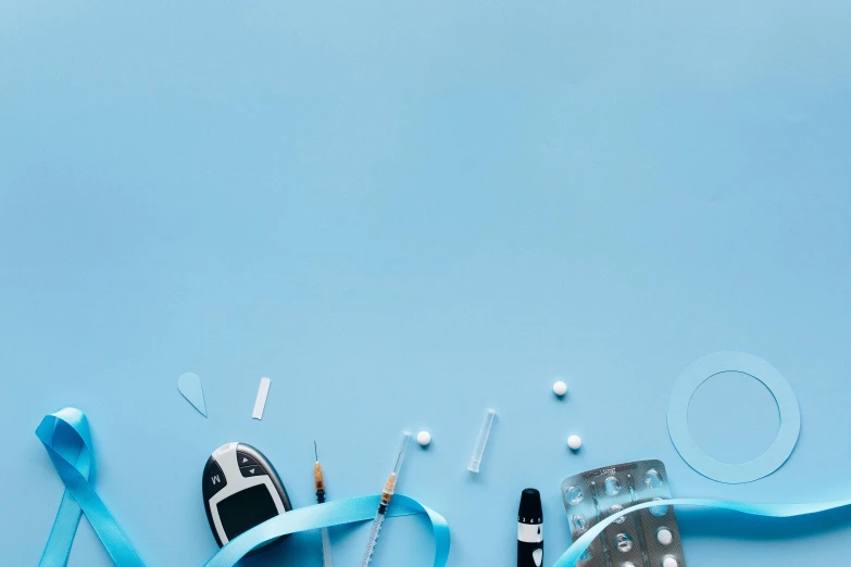 medical supplies laid out on a blue surface, trending on pexels, figuration libre, blue silver and black, background image, candy treatments, iv drip