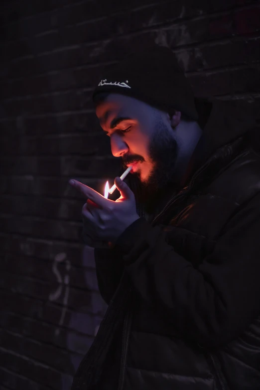 a man smoking a cigarette in front of a brick wall, an album cover, pexels contest winner, realism, night time low light, post malone, profile pic, (fire)