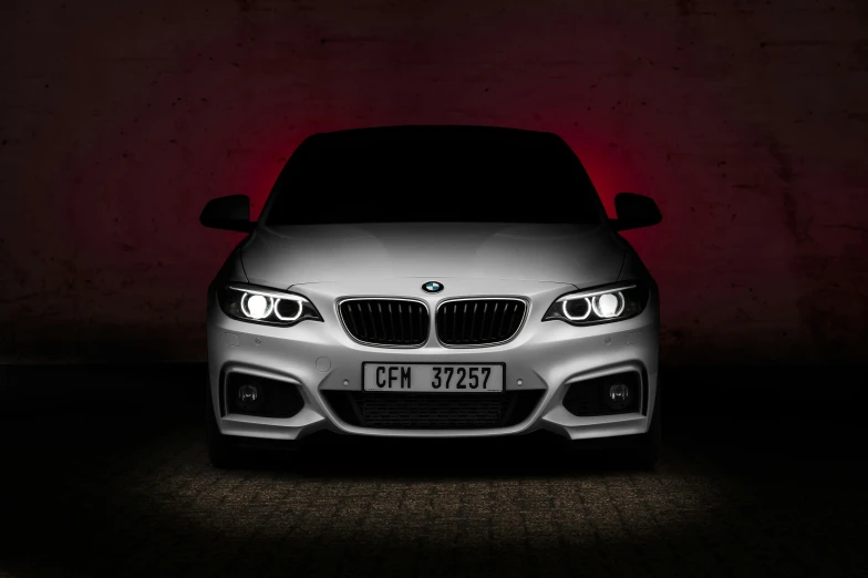 a white bmw car in a dark room, inspired by An Gyeon, pexels contest winner, renaissance, eyes are glowing red lightbulbs, photographic render, 22 megapixels, black on white