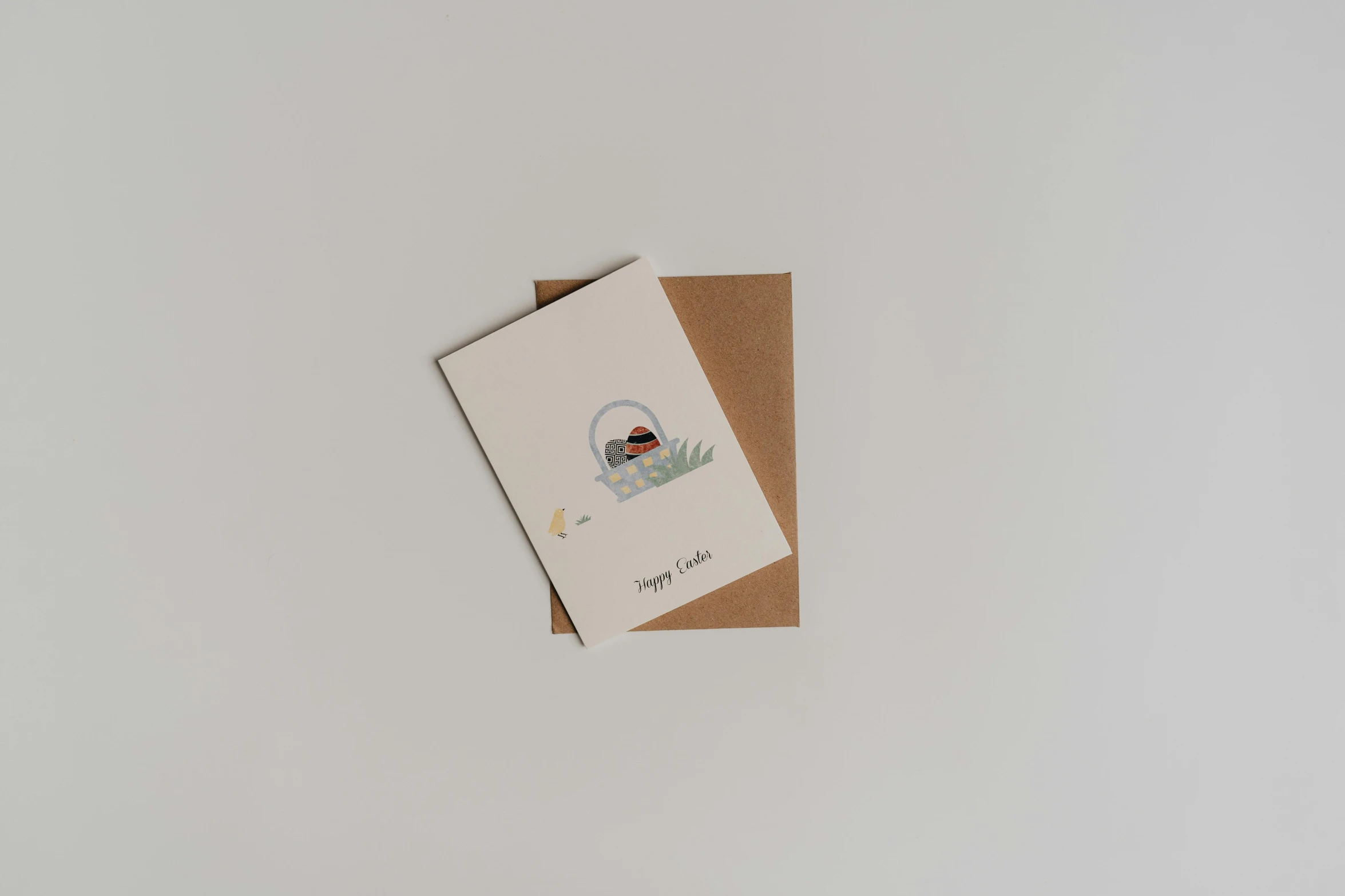 a card sitting on top of a brown envelope, by Emma Andijewska, mingei, happy cozy feelings, small lake, cart, ignant