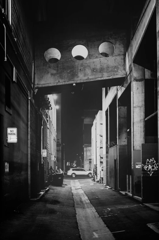 a black and white photo of a street at night, a black and white photo, by Torii Kiyomoto, conceptual art, cyberpunk garage on jupiter, north melbourne street, monochrome:-2, japanese downtown