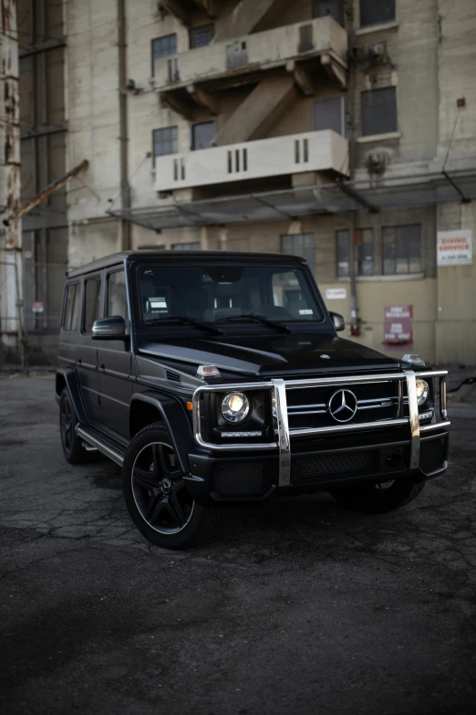 a black mercedes benz benz benz benz benz benz benz benz benz benz benz benz benz benz benz, an album cover, unsplash, jeep in background, getty images proshot, very buff, in 2 0 1 2