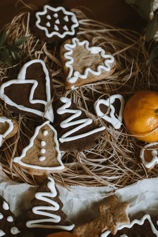 a bunch of cookies sitting on top of a table, a still life, by David Garner, pexels contest winner, organic ornament, white and orange, hearts, thumbnail