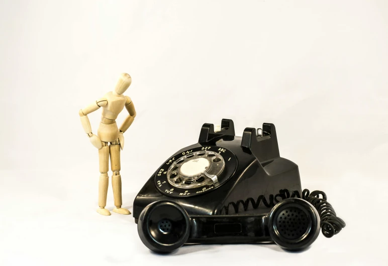 a wooden figure standing next to a black telephone, a surrealist sculpture, unsplash, figuration libre, robot model kit, vintage - w 1 0 2 4, “ full body, part robot and part black human