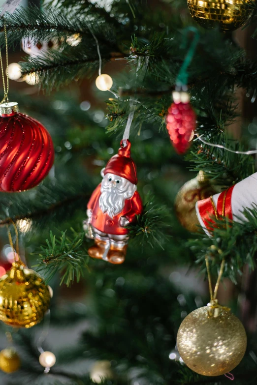 a close up of a christmas tree with ornaments, inspired by Ernest William Christmas, gnome, view, glassware, traditional medium