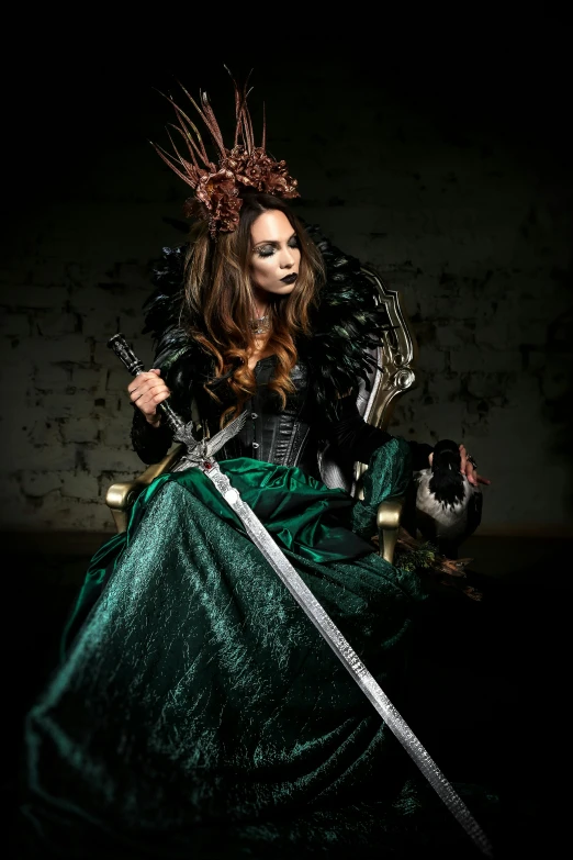 a woman in a green dress holding a sword, a portrait, inspired by Júlíana Sveinsdóttir, pexels contest winner, gothic art, sitting on a metal throne, scrap metal headdress, black metal rococo, intricate costume design