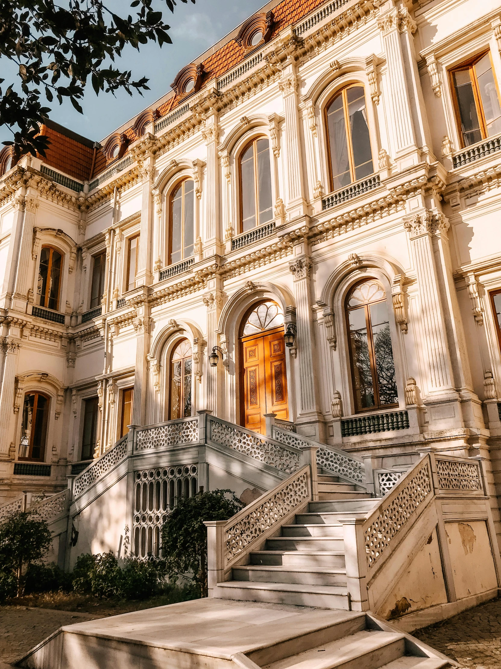 a building with a bunch of stairs in front of it, inspired by Luis Paret y Alcazar, pexels contest winner, art nouveau, chile, in style of classicism, in their noble mansion, profile image