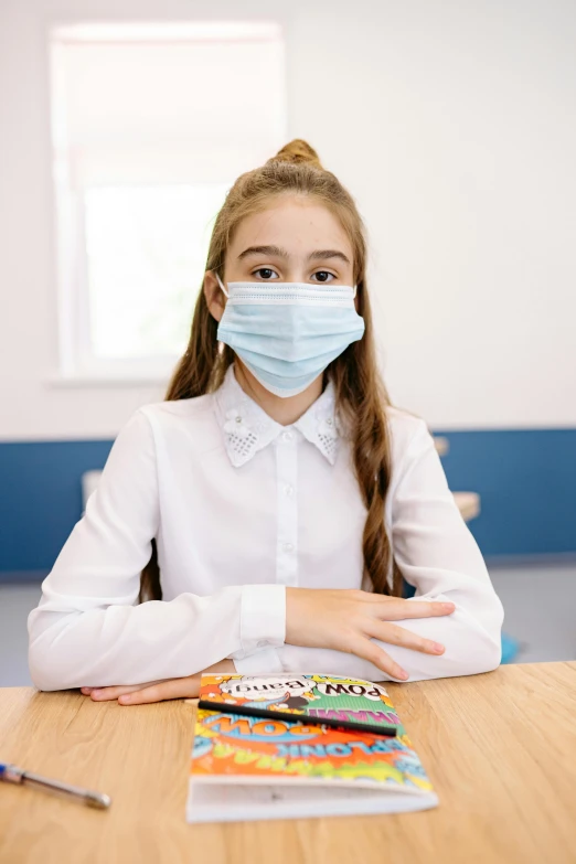 a girl sitting at a table wearing a face mask, a picture, danube school, extra high resolution, album cover, medicine, 4 0 0 0 0 0