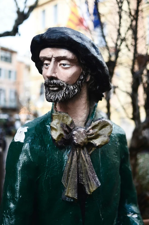 a statue of a man with a beard and a hat, inspired by Pál Szinyei Merse, unsplash, new sculpture, beautifully painted, young spanish man, fisherman, made of wax and metal