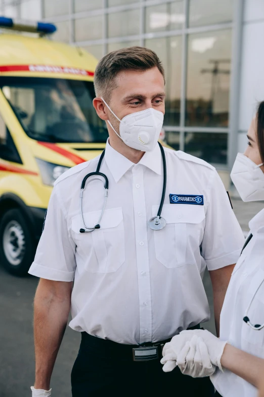 a couple of people that are standing in front of a ambulance, white uniform, facemask, detailed »