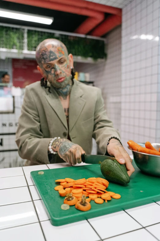 a man is cutting carrots on a cutting board, a tattoo, inspired by James Bolivar Manson, trending on tumblr, ap news photograph, still from the matrix, in sao paulo, full-body tattoos