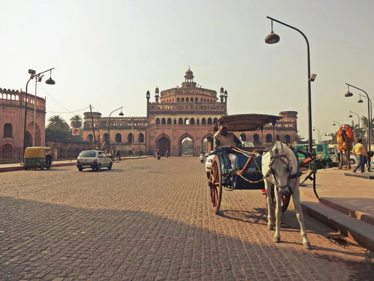 a horse pulling a carriage in front of a building, by Riza Abbasi, giant majestic archways, surrounding the city, profile image, square