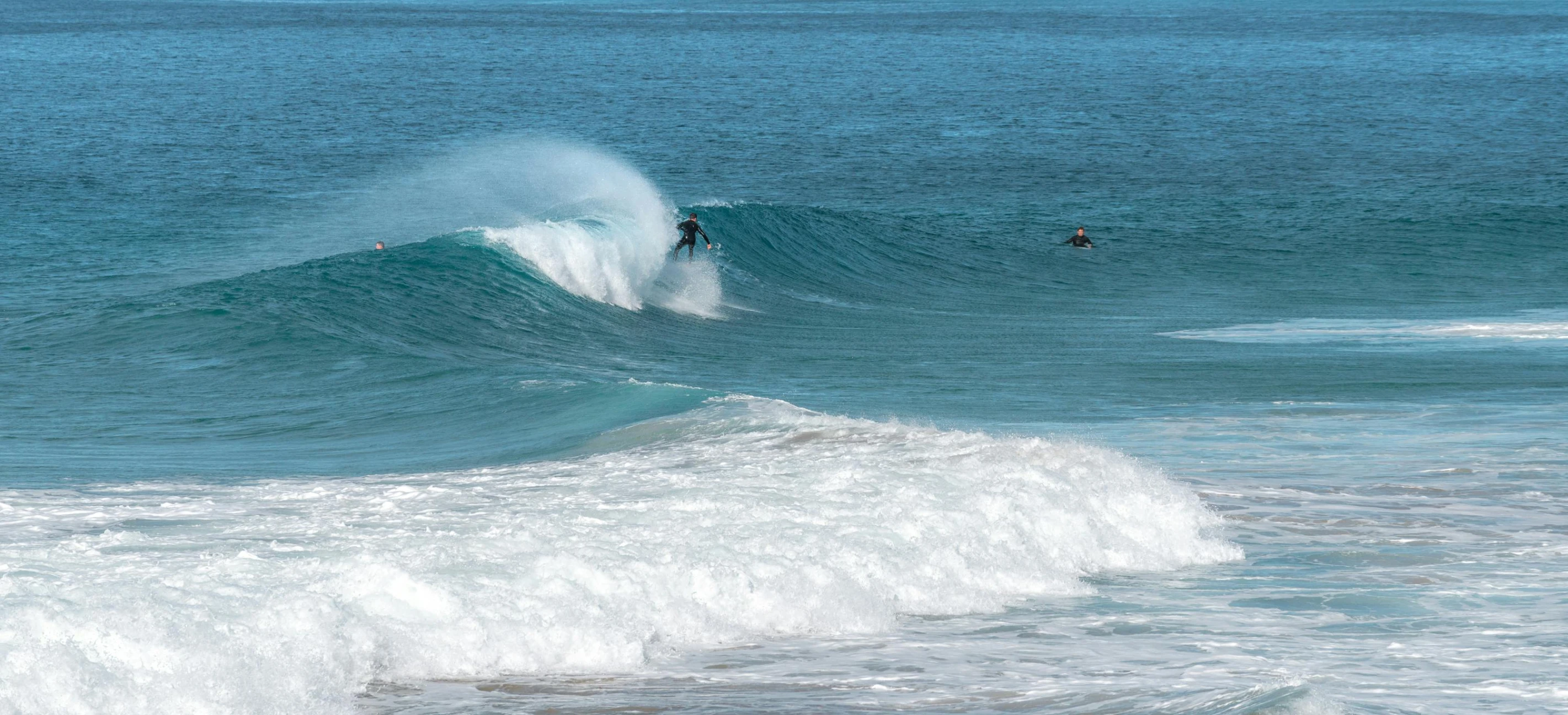 a man riding a wave on top of a surfboard, a photo, pexels contest winner, figuration libre, australian beach, turquoise ocean, barrels, today\'s featured photograph 4k