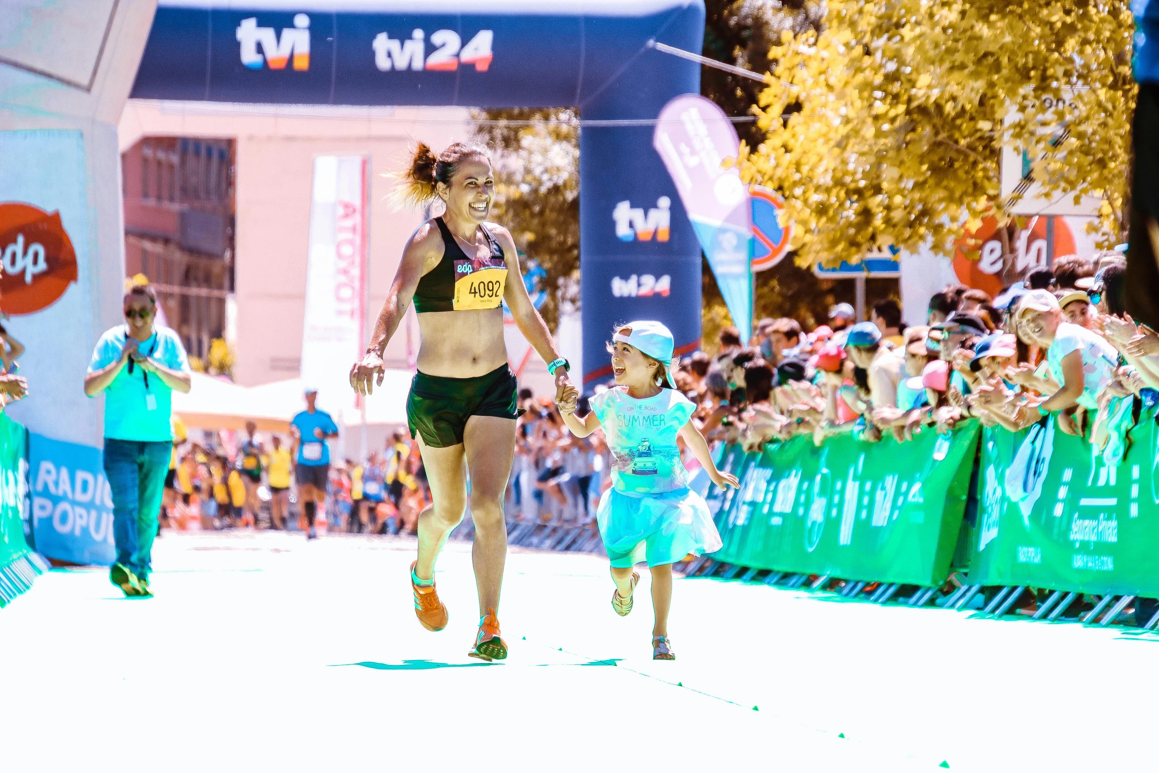 a woman that is running in a race, by Lee Loughridge, pexels contest winner, happening, ruan jia and mandy jurgens, square, tv, happy kid