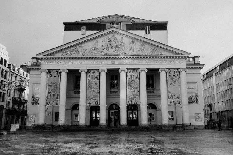 a black and white photo of a large building, a black and white photo, pixabay, neoclassicism, theater, hasbulla magomedov, square, analog photo